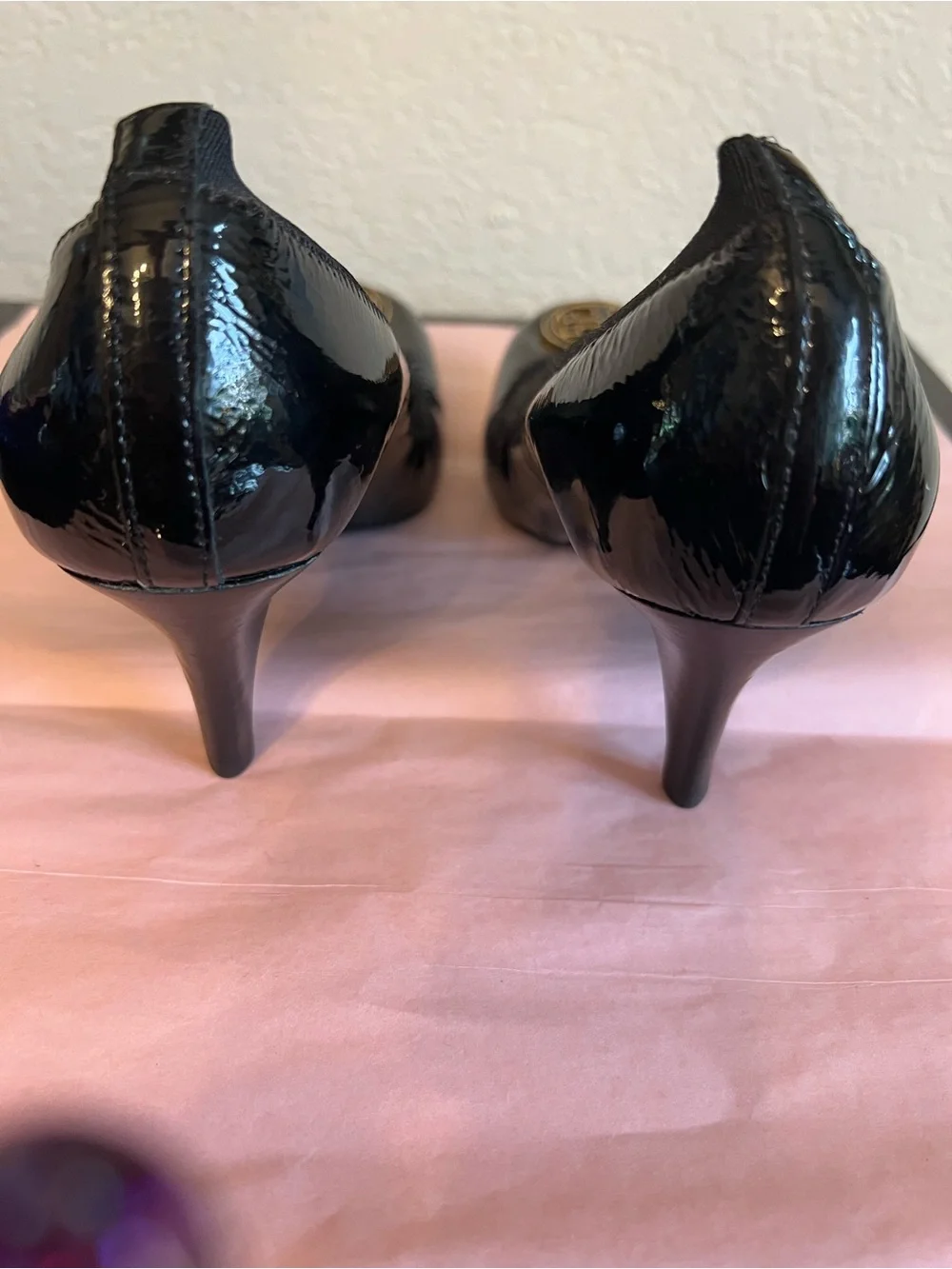 Tory Burch Black Patent Logo Round-Toe Pumps with Gold Emblem
